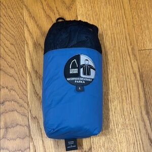 Men's Sierra Designs Blue packable Waterproof Parka size Large